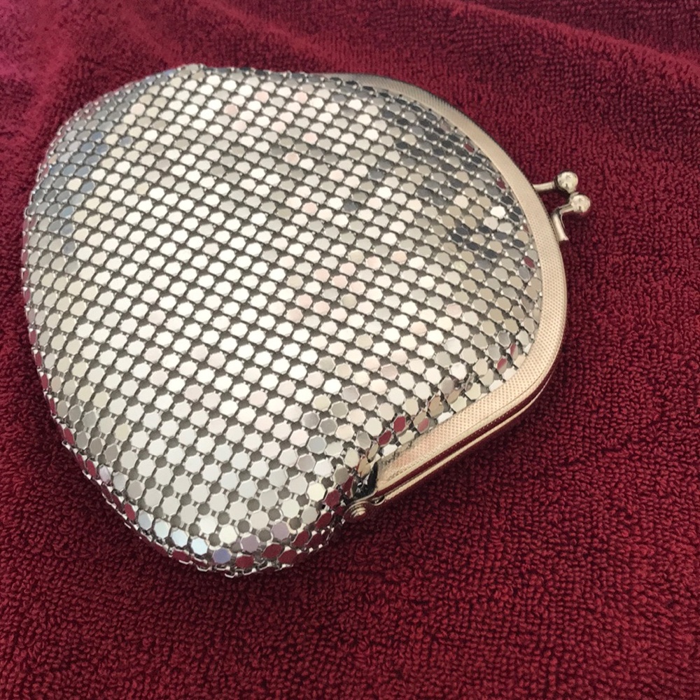 Small silver clutch bag